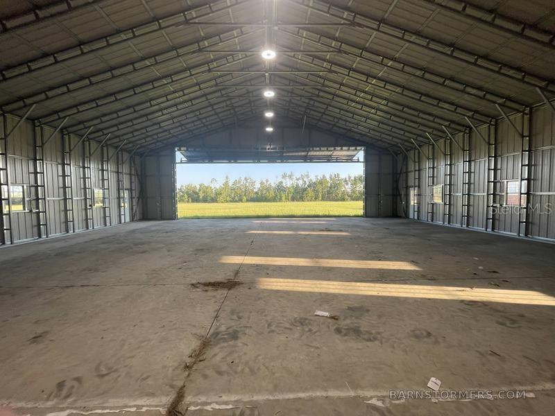Private Airport, New Hangar Building, House, and 80 Acres For Sale near Panama City, FL $900,000